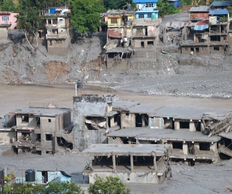  Significant damage to buildings after severe flooding. 