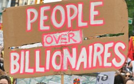 Sign that says people over billionaires