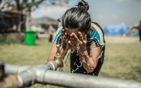 Nepal-earthquake-woman-clean-water-OGB92101.jpg