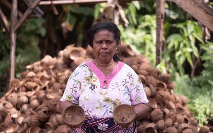 Mama Dalu is a farmer in East Flores, Indonesia, who participated in a program through Oxfam partner YPP that trained her to make charcoal briquettes out of coconut shells.