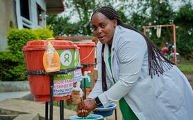 Nurse uses a handwashing station installed by Oxfam at the Shari Health Centre in Ituri province, eastern Democratic Republic of Congo.
