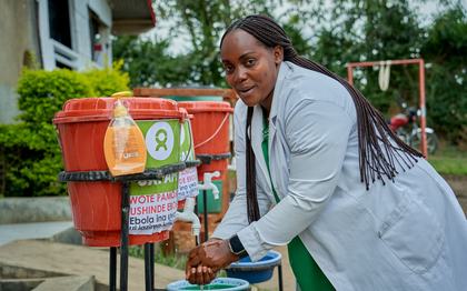 Nurse uses a handwashing station installed by Oxfam at the Shari Health Centre in Ituri province, eastern Democratic Republic of Congo.