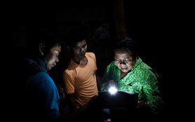 cambodia-community-meeting-flashlight-ous-51324-h.jpg