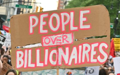 Photo of a protest in Manhattan on May Day, 2025, against President Trump, his administration, and billionaire cronies.