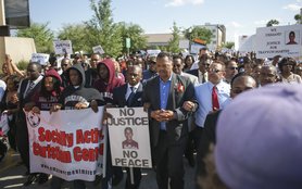 Pastor Jamal Bryant and Reverend Jesse Jackson march in support of Trayvon Martin on March 26, 2012 in Sanford Florida. Credit: Ira Bostic