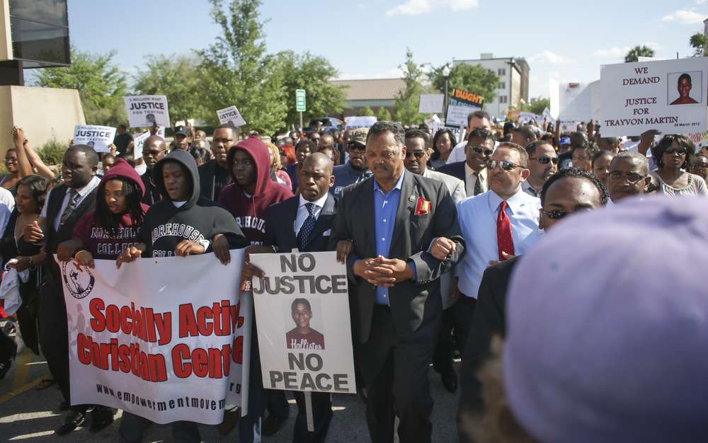 Pastor Jamal Bryant and Reverend Jesse Jackson march in support of Trayvon Martin on March 26, 2012 in Sanford Florida. Credit: Ira Bostic