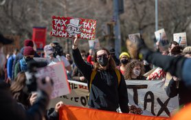 tax the rich protest davos report.jpg